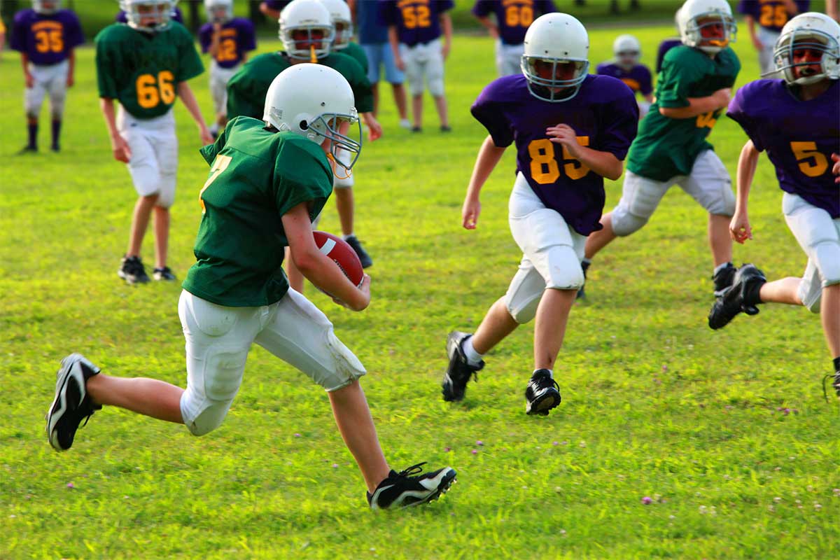 kids playing football