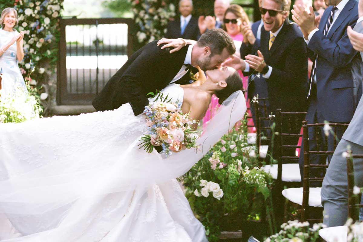 bride and groom kissing