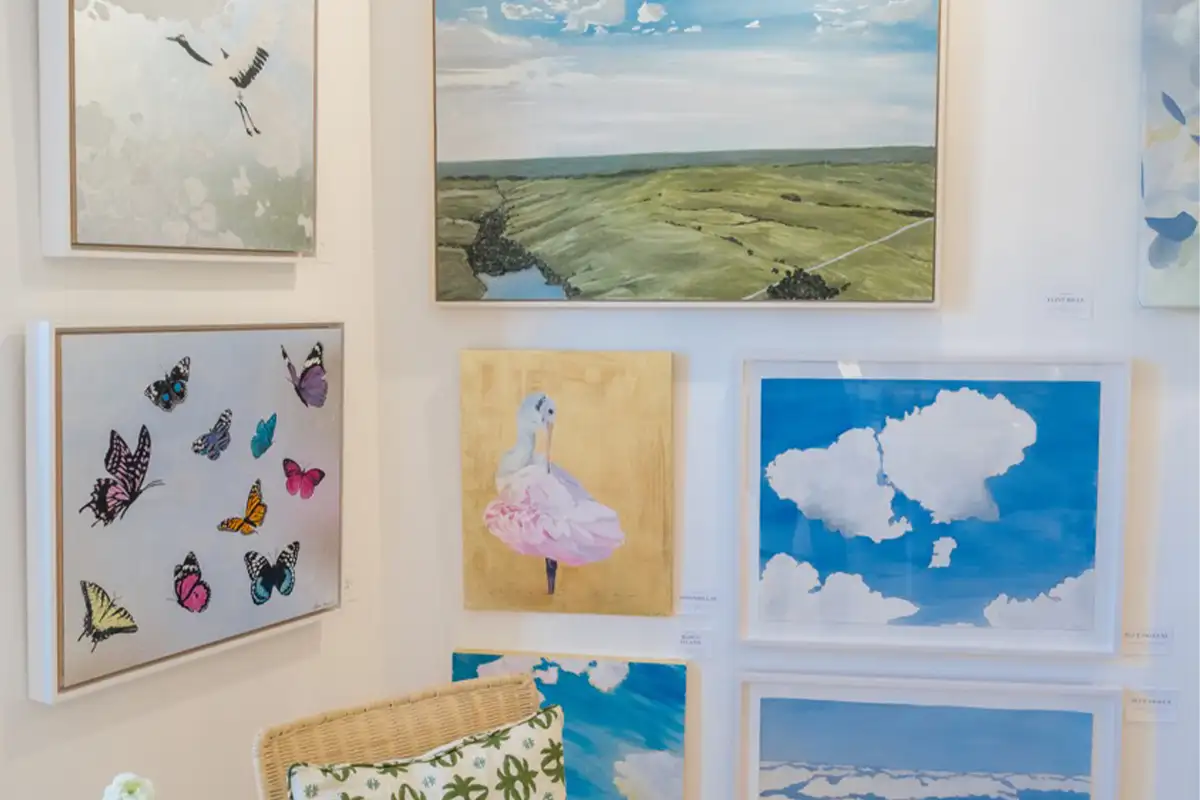 prints hang on a wall in Castle Gallery in Middleburg