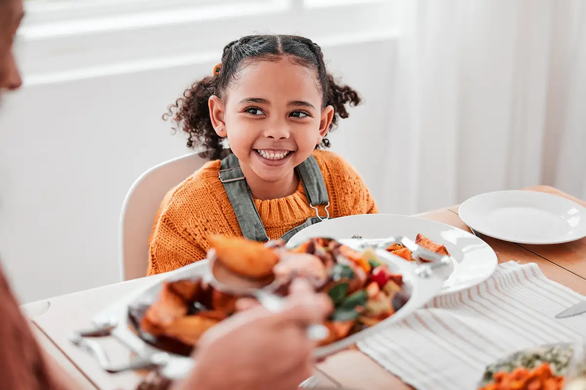 Little girl at Thanksgiving dinner