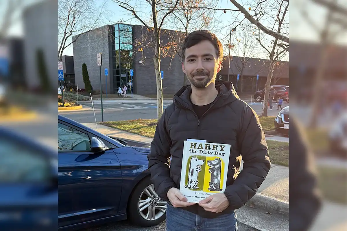 dimitris economou holding copy of harry the dirty dog