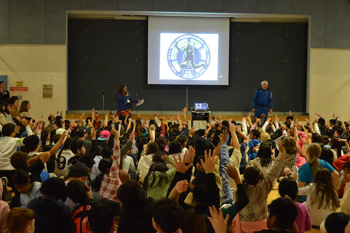 Blue Origin astronaut George C. Nield gives a presentation at North Springfield Elementary School.