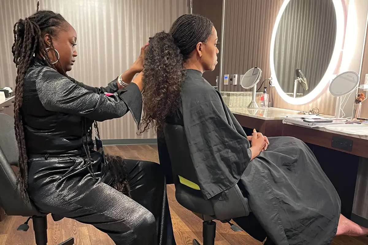 Njeri Radway working on Michelle Obama’s hair