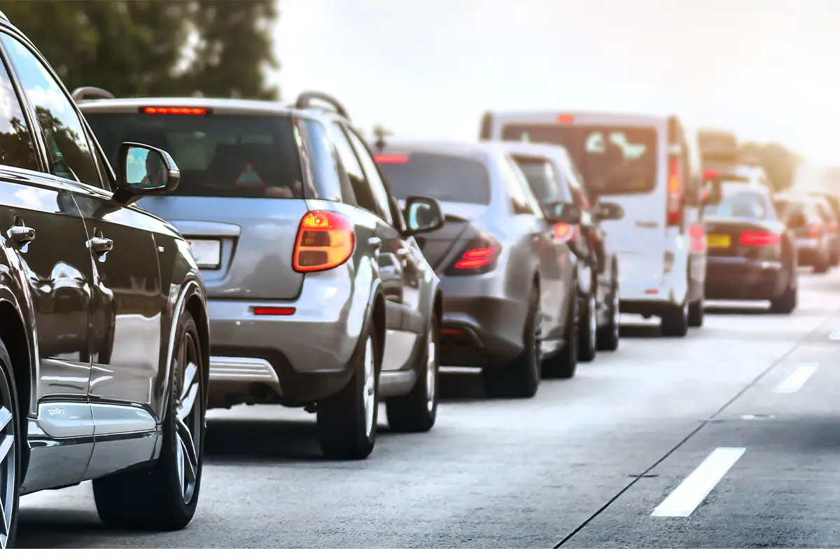 cars on a road stopped for heavy traffic