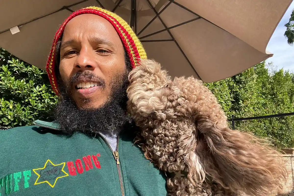 Ziggy Marley and his dog, Romeo